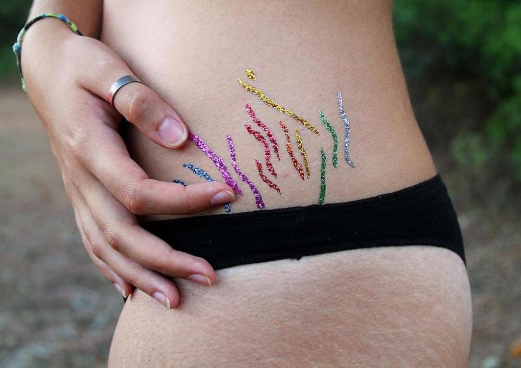 Spanish artist urges women to turn their stretch marks into rainbows